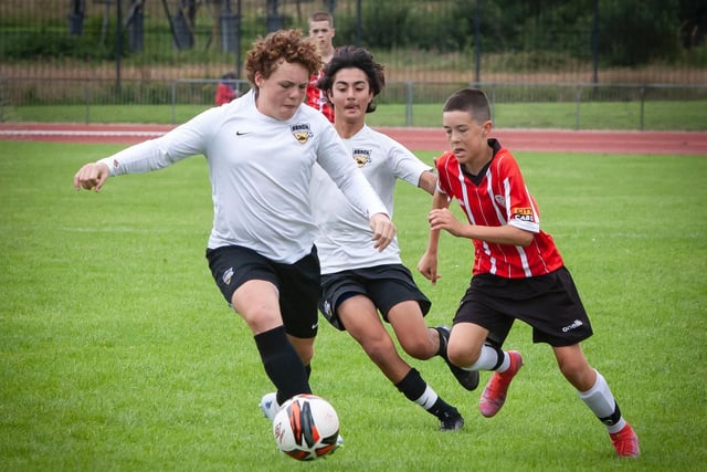 Beach FC's Brogan Comer gets possession during Thursday's u-14 Foyle Cup final group match against Derry City.