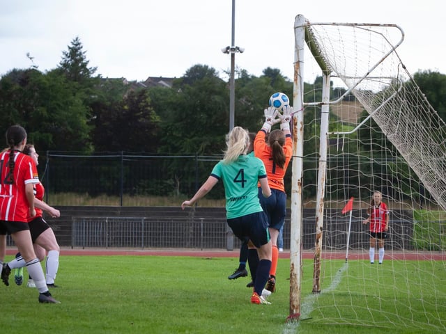 Swifts keeper Kerry McCready palms this shot from a corner over the crossbar in the u-16 Foyle Cup Ladies final against Derry City at Swilly Stadium on Thursday night.