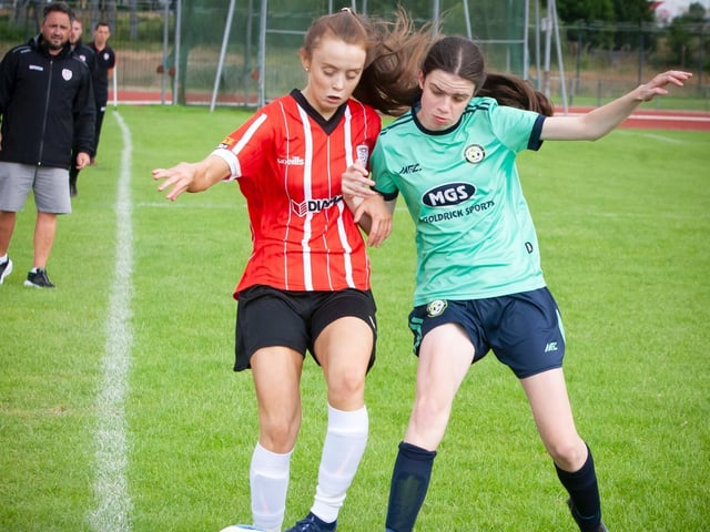 Derry City's Kayleigh Carlin and Sion's Clara Mullen in a tussle for possession in the Foyle Cup u-16 Ladies final at Templemore.