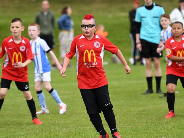 Concentration on the face Cumann Spoirt an Phobail under-10's defender James Gargan.