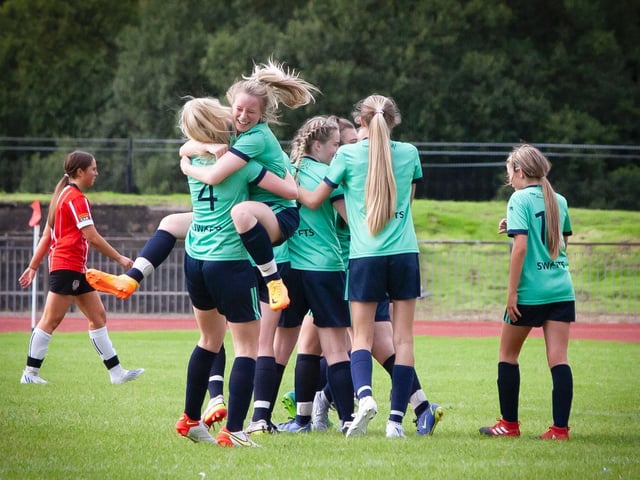 Sion Swifts celebrate victory in the Foyle Cup Ladies u-16 final over Derry City at Swilly Stadium on Thurday evening.