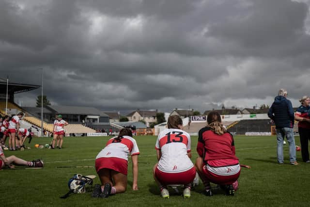 Derry's Aine McAllister and Aoife Shaw dejected after Sunday's Glen Dimplex All-Ireland Intermediate Camogie Championship Semi-Final in UMPC Nowlan Park, Co. Kilkenny. (Photo: INPHO/Evan Treacy)