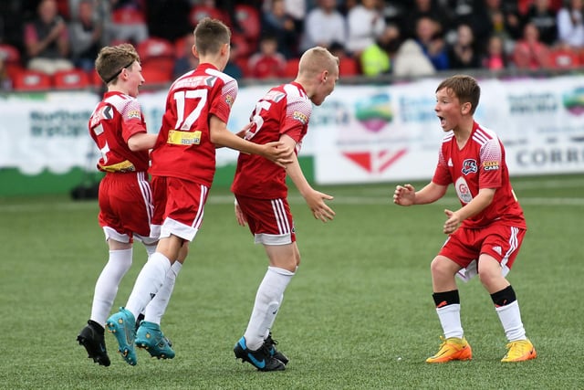 The Maiden City Academy under-12's celebrate one of their goals during their Foyle Cup Under-12's victory against Coleraine F.C. at the Brandywell on Saturday. Picture by Keith Moore