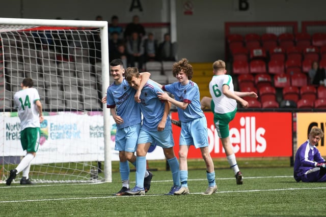 Institute under-16's goalscorer Callum Ming is congratulated by team-mates after clinching their victory against Wythenshawe Amateurs. Picture by Keith Moore