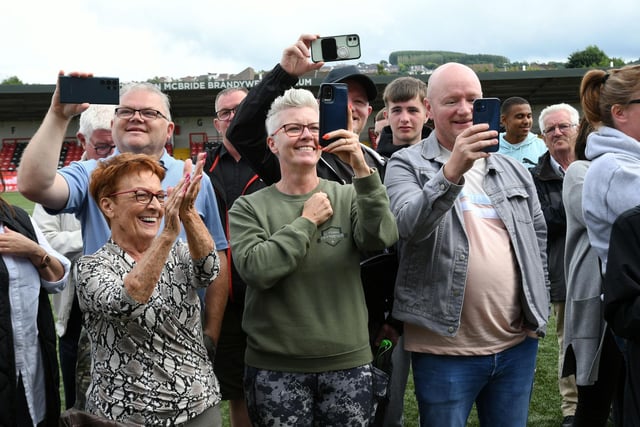 Proud family members capture the presentation of the O'Neill's Foyle Cup Under-16's trophy to Institute at the Brandywell. Picture by Keith Moore