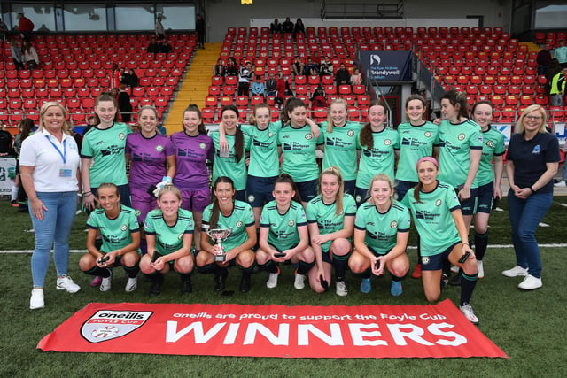 The Sion Swifts team which lifted the O'Neill's Ladies Foyle Cup at the Brandywell on Thursday evening, Included are, Amanda Creagh, left, and Claire Brown, from Craft Training, who presented the cup and medals. Picture by Keith Moore