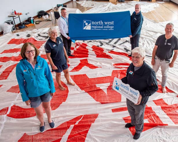 Group pictured in the Sports Hall of NWRC's Strand Road campus where the crew of the Ha Long Vietnam Boat repaired their sail: L-R Aileen Croft, Crew, Jacqui Webb, Crew, Brian McParland, Estates Officer, NWRC, Conor McGurgan, Marketing and PR Manager, NWRC, Gerard Doherty, Crew, and Jim Cubitt, Crew. (Picture Martin McKeown)