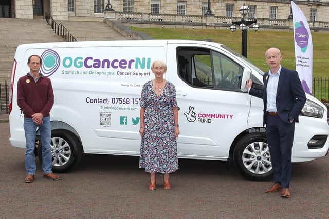 (L-R) Adrian Hale, Noeleen McMorris, Kevin Campbell and OG Cancer NI Mobile Unit at Stormont. (By Peter O'Hara)