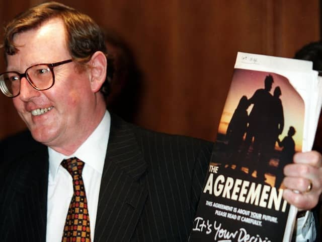 PACEMAKER BELFAST 18/04/98 Ulster Unionist Party leader David Trimble pictured with his copy of the Agreement at a press conference in the Europa Hotel in Belfast where he won the big vote by his party on weather to endorse the Mitchell Agreement or not.