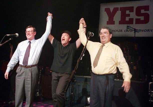 Iconic photo: Ulster Unionist leader David Trimble, SDLP leader John Hume and Bono of U2 pictured together in 1998. Picture Paul Faith / Pacemaker.