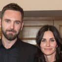 Johnny McDaid and his fiancee Courtney Cox.