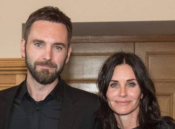 Johnny McDaid and his fiancee Courtney Cox.