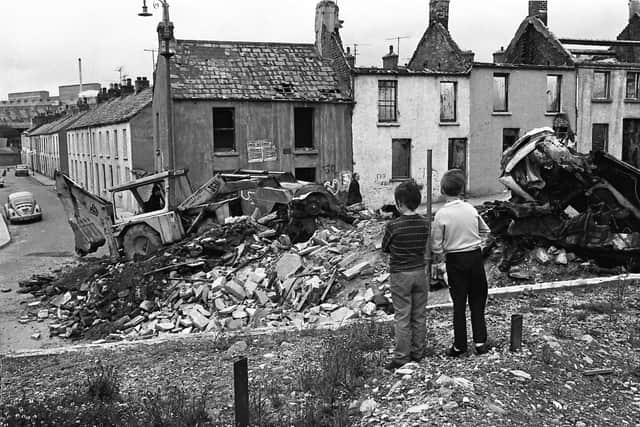 A barricade is removed at Little Diamond in the city's Bogside in the wake of Operation Motorman.