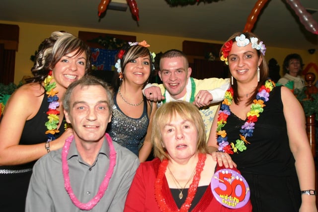 December 2005... Ann Lindsay enjoying her 50th birthday party with husband Billy and, at back, Emma, Ciaria,Steven and Nicola.