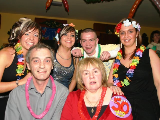 December 2005... Ann Lindsay enjoying her 50th birthday party with husband Billy and, at back, Emma, Ciaria,Steven and Nicola.