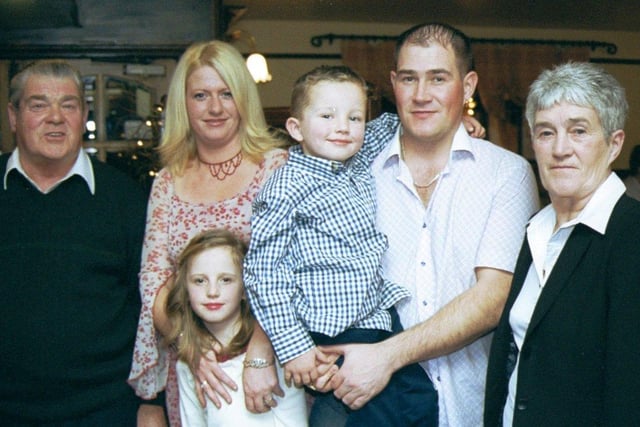 September 2002... 30th birthday boy David Miller pictured with members of his family at a party in The Villager, Eglinton.