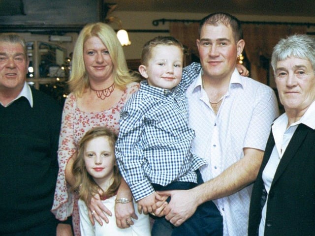 September 2002... 30th birthday boy David Miller pictured with members of his family at a party in The Villager, Eglinton.