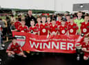 John Murphy from O'Neill's pictured with the Maiden City Academy team which lifted the O'Neill's Foyle Cup Under-12's trophy at the Brandywell on Saturday. Picture by Keith Moore