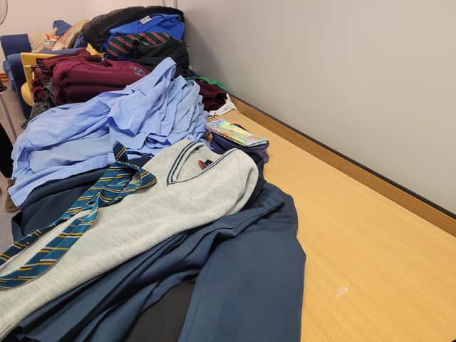 Some of the school uniforms available for those who need them.