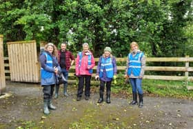 Trish Murphy from IWT along with other ECO Carn volunteers at a previous balsalm bashing event along the Donagh River.