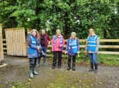 Trish Murphy from IWT along with other ECO Carn volunteers at a previous balsalm bashing event along the Donagh River.