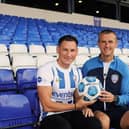 Oran Kearney welcomes new signing Conor McDermott to Coleraine. (Credit: Lori Watton/Coleraine FC