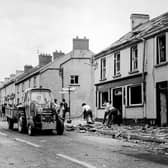 Clearing up after the explosion of three bombs in Claudy. Photo courtesy Victor Patterson.