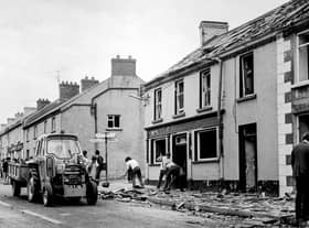 Clearing up after the explosion of three bombs in Claudy. Photo courtesy Victor Patterson.