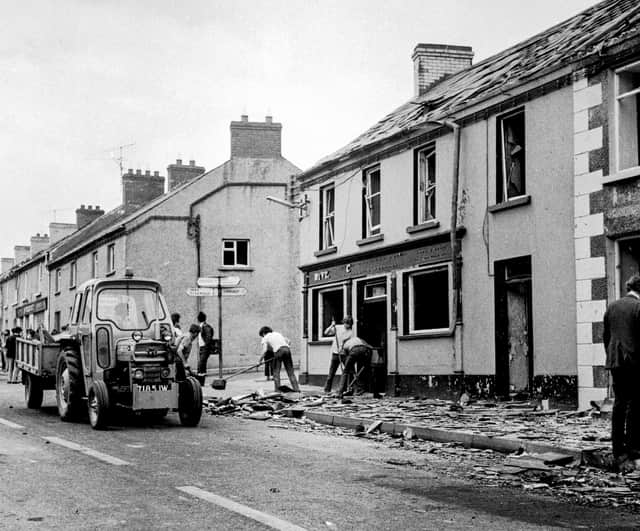Clearing up after the explosion of three bombs in Claudy. Photo courtesy Victor Patterson.