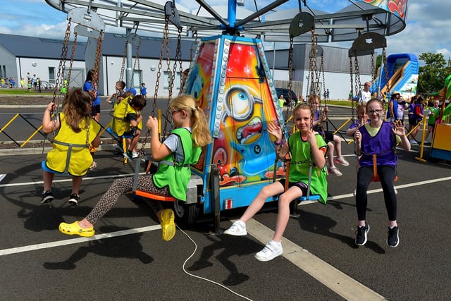 Children enjoy the sunshine and activities at the Hillcrest Trust and Irish Street Youth and Community Association’s Waterside Shared Village Summer Scheme at the An Chroí Community Hub on Friday afternoon last. Photo: George Sweeney.  DER2230GS – 016