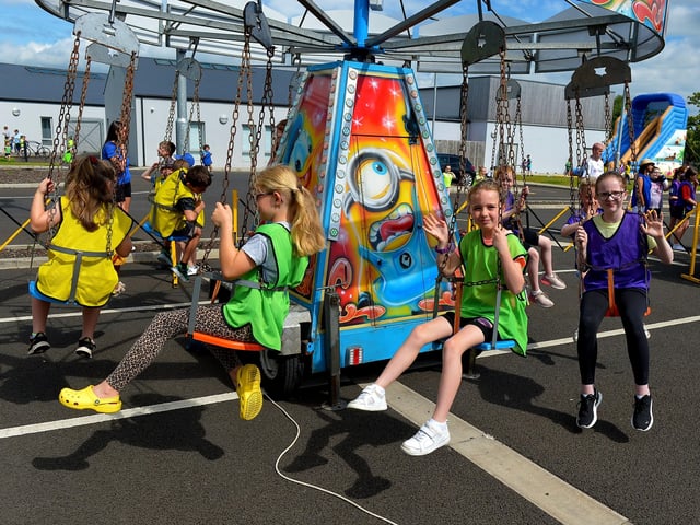 Children enjoy the sunshine and activities at the Hillcrest Trust and Irish Street Youth and Community Association’s Waterside Shared Village Summer Scheme at the An Chroí Community Hub on Friday afternoon last. Photo: George Sweeney. DER2230GS – 016