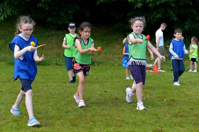 An egg and spoon race underway at the Hillcrest Trust and Irish Street Youth and Community Association’s Waterside Shared Village Summer Scheme at the An Chroí Community Hub on Friday afternoon last. Photo: George Sweeney.  DER2230GS – 024