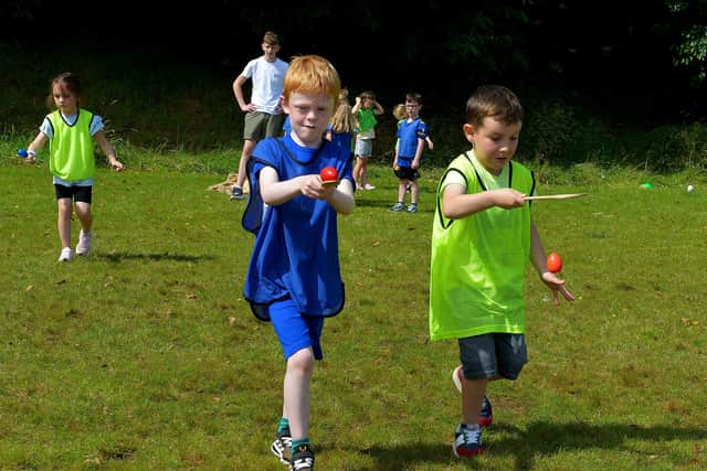 Serious concentration during the egg and spoon race at the Hillcrest Trust and Irish Street Youth and Community Association’s Waterside Shared Village Summer Scheme at the An Chroí Community Hub on Friday afternoon last. Photo: George Sweeney.  DER2230GS – 025