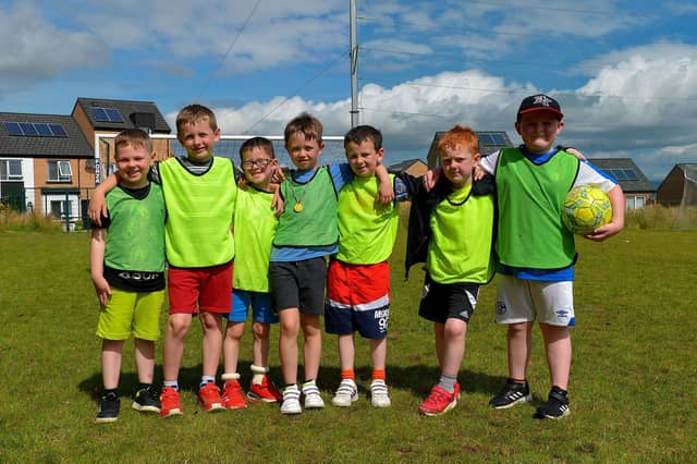 Young soccer players at the Hillcrest Trust and Irish Street Youth and Community Association’s Waterside Shared Village Summer Scheme at the An Chroí Community Hub on Friday afternoon last. Photo: George Sweeney. DER2230GS – 022