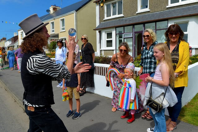 Street entertainment during the Clonmany Festival Parade held on Sunday afternoon last. Photo: George Sweeney.  DER2231GS – 004