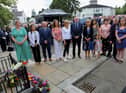 Families of the nine victims who laid floral tributes at the "Remembering Claudy Innocents" 50th anniversary on Sunday afternoon last. DER2231GS - 042