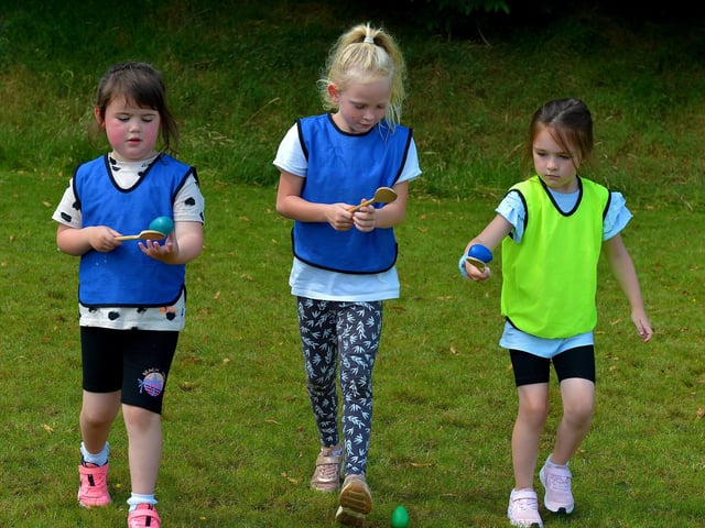 An egg and spoon race underway at the Hillcrest Trust and Irish Street Youth and Community Association’s Waterside Shared Village Summer Scheme at the An Chroí Community Hub on Friday afternoon last. Photo: George Sweeney. DER2230GS – 026