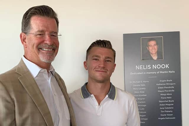 Martin’s son Aidan, on right, with the Deputy Mayor of Pleasant Hill, Tim Flaherty, a close friend of Martin’s, at the officialy opening of the ‘Nelis Nook’.