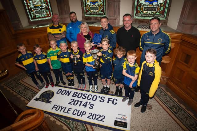 The Mayor of Derry City and Strabane District Council, Sandra Duffy pictured making a special presentation to the successful Don Boscos U8's team and their coaches at a special reception in the Guildhall on Monday evening. Boscos picked up the Foyle Cup and the FonaCAB Youth Cup 2022. Picture by Jim McCafferty Photography