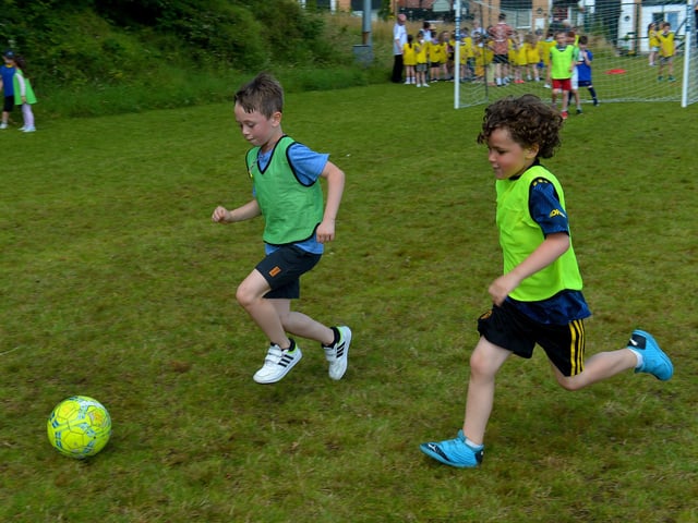 Soccer was one of the sports on offer at the Hillcrest Trust and Irish Street Youth and Community Association’s Waterside Shared Village Summer Scheme at the An Chroí Community Hub on Friday afternoon last. Photo: George Sweeney. DER2230GS – 027
