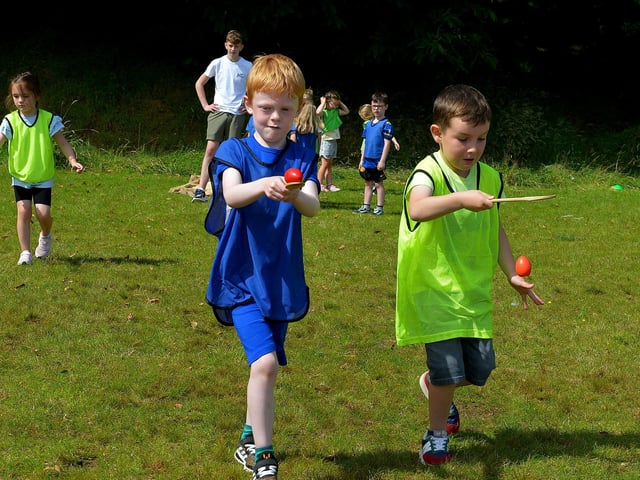 Serious concentration during the egg and spoon race at the Hillcrest Trust and Irish Street Youth and Community Association’s Waterside Shared Village Summer Scheme at the An Chroí Community Hub on Friday afternoon last. Photo: George Sweeney. DER2230GS – 025