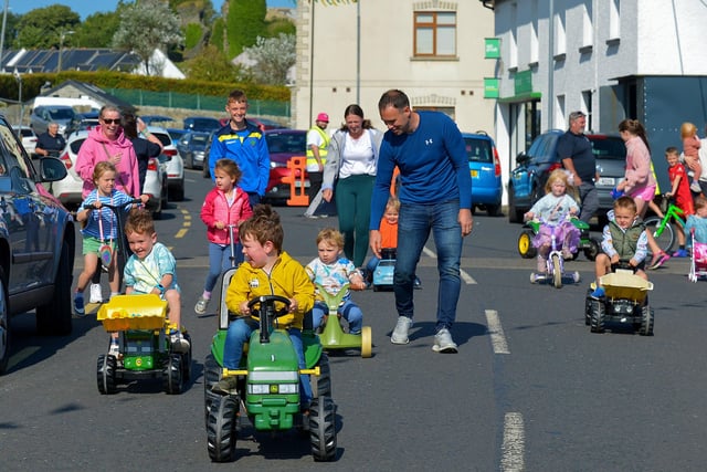 The Pedal Powered Tractor Run and Doll Push underway at the Greencastle Regatta on Friday afternoon last. Photo: George Sweeney.  DER2231GS – 072