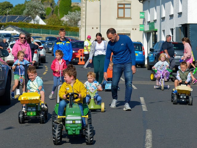 The Pedal Powered Tractor Run and Doll Push underway at the Greencastle Regatta on Friday afternoon last. Photo: George Sweeney. DER2231GS – 072