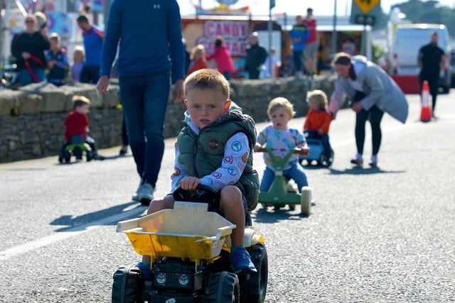 Children taking part in the Pedal Powered Tractor Run and Doll Push race at the Greencastle Regatta on Friday afternoon last. Photo: George Sweeney.  DER2231GS – 078