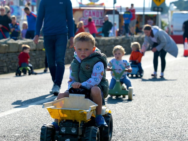 Children taking part in the Pedal Powered Tractor Run and Doll Push race at the Greencastle Regatta on Friday afternoon last. Photo: George Sweeney.  DER2231GS – 078
