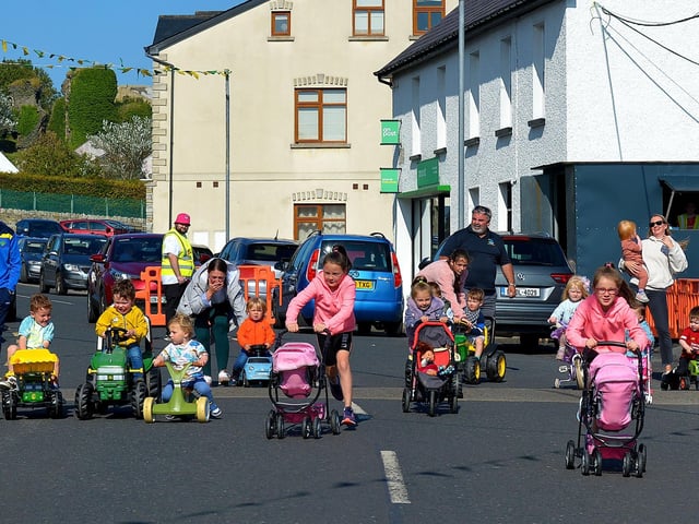 The children’s Pedal Powered Tractor Run and Doll Push gets underway at the Greencastle Regatta, on Friday afternoon last. Photo: George Sweeney. DER2231GS – 069