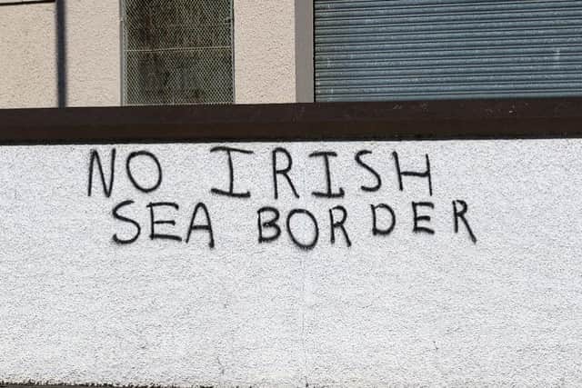 ‘No Irish Sea Border’ graffiti on a wall on Rossdowney Road in the Waterside. DER2114GS – 005