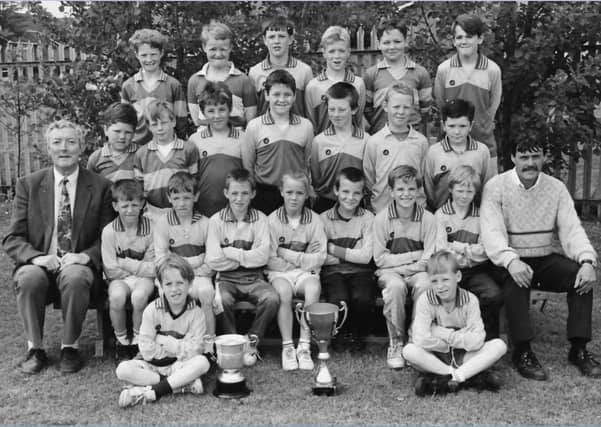 Mr Sean Friel, pictured left, with a colleague and past pupils, is fondly remembered by all who knew him.