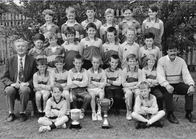 Mr Sean Friel, pictured left, with a colleague and past pupils, is fondly remembered by all who knew him.