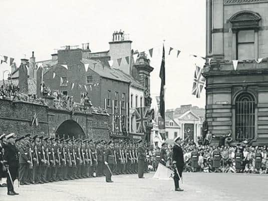 The scene in Derry in July 1953 when Elizabeth II of Great Britain and Northern Ireland and Prince Philip visited.